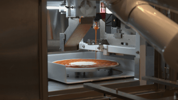 pizza bot adding sauce to a pizza